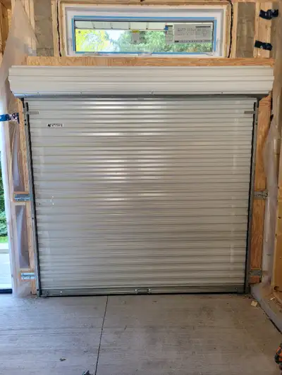 White 8' x 8' Roll-Up Door & Electric Motor $1250, View more