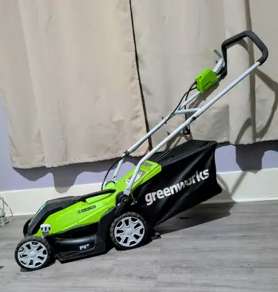 Greenworks 14-Inch 9 Amp Corded Electric Mower. Purchased new in May 2025, only used a few times in...