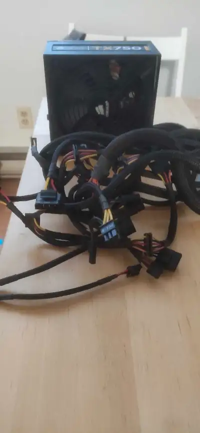 Selling a used Corsair TX750 power supply, a reliable choice for any desktop build. This 750W PSU pr...