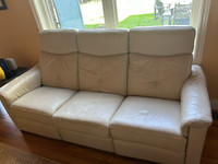 Reclining leather sofa
