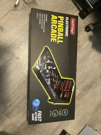 Brand new pinball machine never been opened asking for 20$