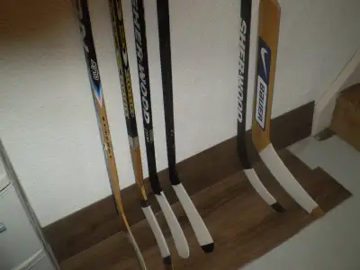 6 HOCKEY STICKS 1 GOALIE STICK  4 L/H + 2 R/H All in Solid Cond., View more