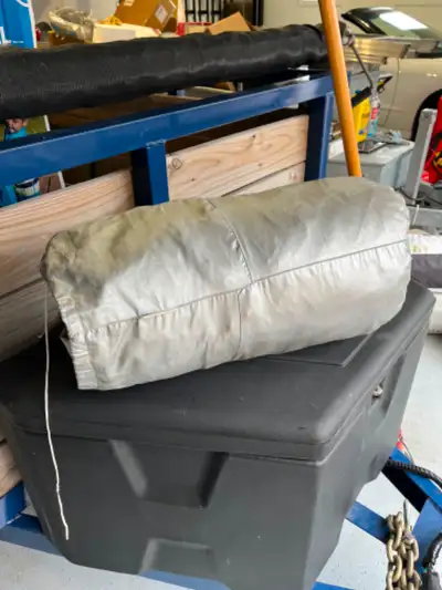 Car Cover Polyester Size E Machine washable Vinyl type material not the soft cloth type its good for...