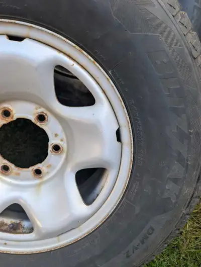 Bridgestone Blizzak DM V2 Winter tires 245-75-16 on 2022. Toyota Tacoma OEM rims with OEM TPMS in go...