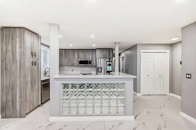 0 DOWN – Fully Renovated 2 BR Condo in Tuxedo, Calgary!