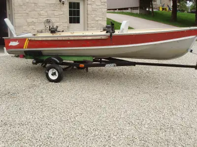 14 FT LUND C 14 FISHERMAN TILLER BOAT C/W TRAILER LUND C 14 FISHERMAN MODEL The 1970s Lund C-14 (oft...
