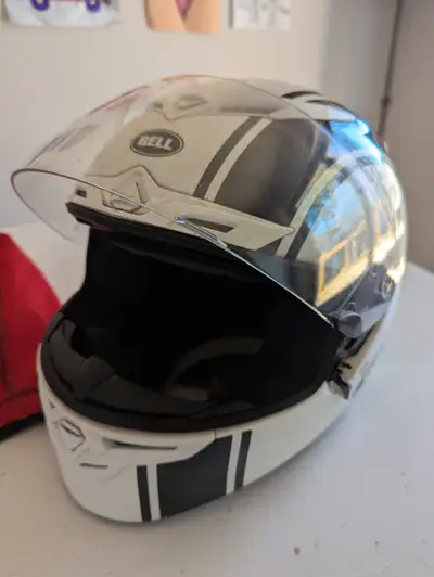 Bell motorcycle helmet Very good condition Color white with black stripe Size large Comes with bag U...