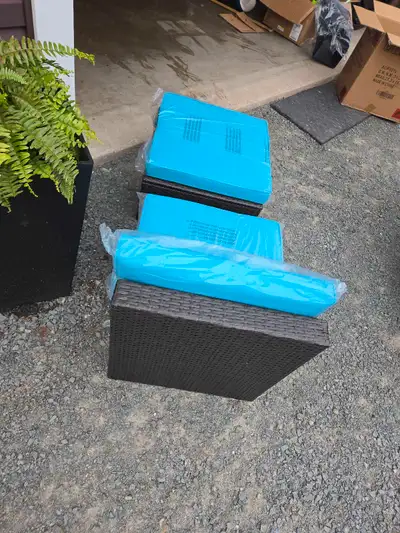 This outdoor armless sofa and ottoman set is brand new and has never been used! It's the perfect add...