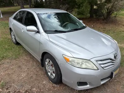 2011 Toyota Camry for sale as is. Not safetied. Known issues include front shocks, (coil spring is b...