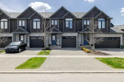 Mint condition Multi-Level Condo with Single Car Garage located in Meadowlily By Rembrandt Homes. Cl...
