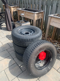 Set of four Michelin Latitude x-ice winter tires on steel rims