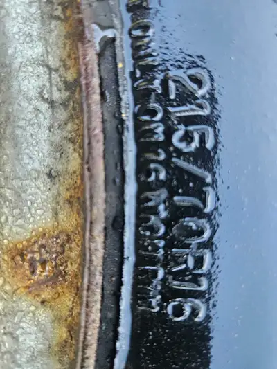 Four 215/70R16 studded snow tires on rather rusty rims bolt pattern 5x114.3 (5x4.5") tread depth mea...