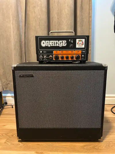 Selling my Orange head and traynor cab. The head was a limited addition Jim Root signature. They wer...