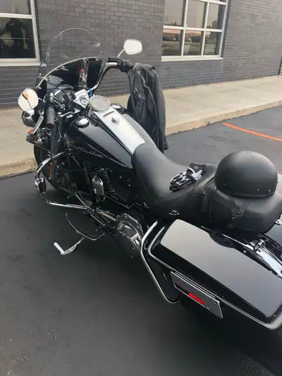 I have owned this 2009 Road King since 2018. It was purchased from Winnipeg Harley Davidson. Current...