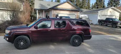 2011 Honda Ridgeline 305000km Religious maintenanced as this was and is the family vacation rocket....