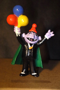 1985 COUNT HOLDING BALLOONS SESAME STREET TOY FIGURE