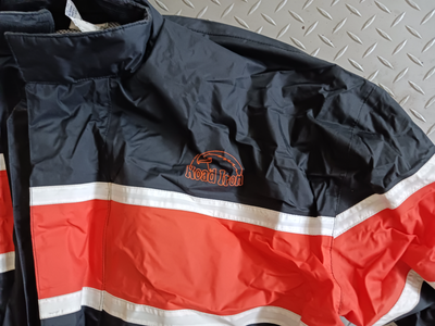 Two pair of motorcycle raingear, View more