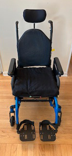 Iris Tilt Wheelchair with ROHO air seat cushion.