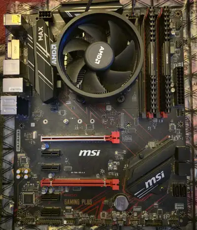 Selling a MSI B450 Gaming Plus Motherboard with a AMD Ryzen 5 2600 CPU, Wraith Stealth Cooler and 16...