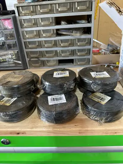 Black tie wire, 9 coils at 3.125 lbs/ coil. 310 ft per roll 16 ga soft for fencing, tying rebar, cra...