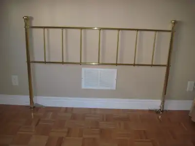 Parents downsizing. You are viewing a brass head board for queen size bed. No clue if it's true soli...