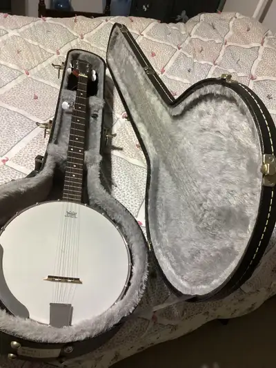 Banjo up for sale like new condition., View more