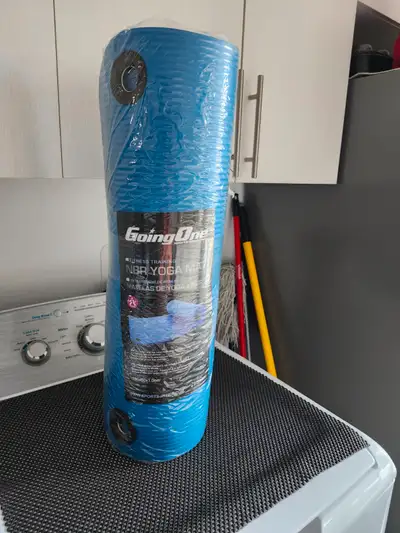 Tapis de yoga neuf dans son emballage.