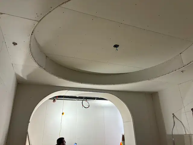 Drywall, taping, framing, insulation and vapour barrier