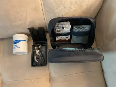 2 pairs of hearing aids..These are older and both take batteries..There are a lot of batteries, some...