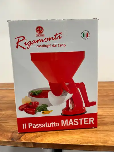 NEW. European tomato processor for juice or paste. Hopper is 7” x 8” x 8”, and entire processor is 1...