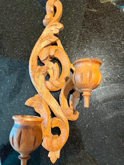 Beautiful hand carved wood piece with candle holder that you could hang on wall.