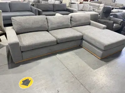 Grey fabric sectional with oversized chaise- demo, View more