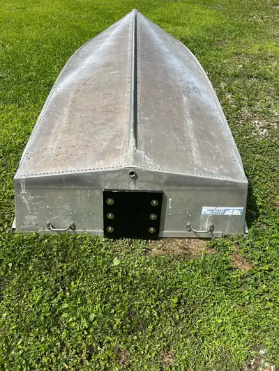 12 ft Gruman $600. A true car topper with a new transom plate. Ideal for rowing, electric motor or s...