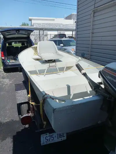 12 ft aluminum by Chrysler 6hp johnson home made trailer good tires winch an trailer jack could sell...