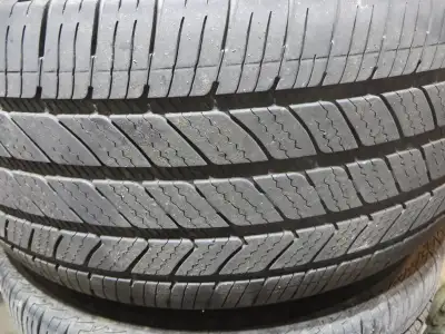 A set of four Bridgestone 245/45R17 " Quiet Track " All season tires mounted on Alloy rims - plus an...