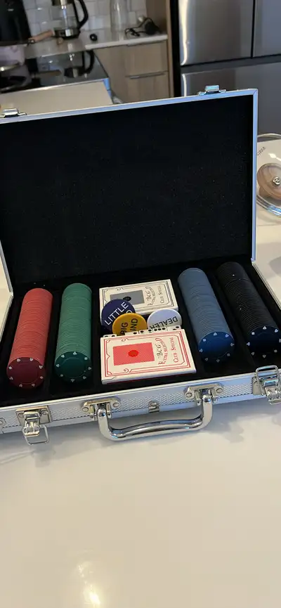 Get ready to host poker nights with this complete poker set! The set includes chips in multiple colo...