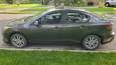 2012 Mazda 3 GS Sedan, Manual Trans., “Graphite” Metallic Grey Manual Transmission 2.0 litre, I4 Eng...