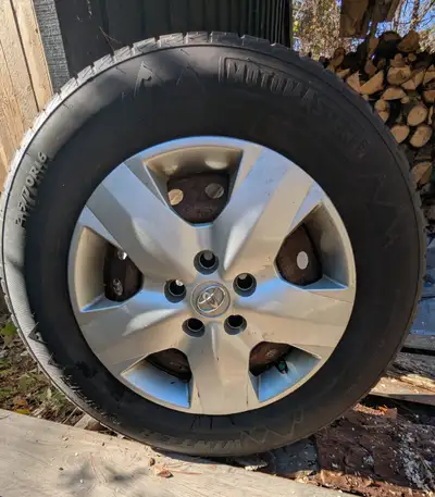 Winter tires on rims. Off a Toyota RAV4 215 70/R16 Tires might be good for 1 more season. Have all 4...