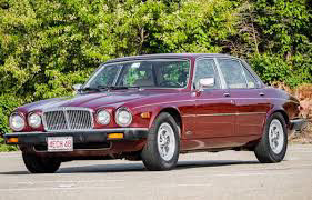 help needed. looking to locate my late fathers 1986 red  jaguar in Cars & Trucks in Kitchener / Waterloo