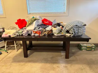 A solid wood dining table, lots of fabrics and a sofa for sale, View more