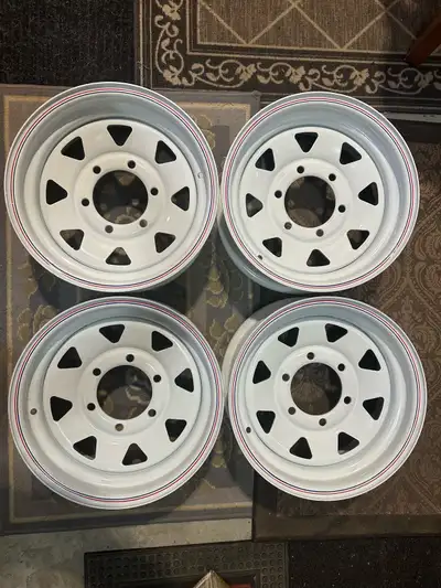 Brand new set of 4 SenDel white rims. Rim size is 14x6. Bolt pattern is 6x5.5. Has 8 spoke design. G...