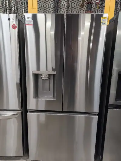 This is a used LG 36-inch French door refrigerator with a sleek stainless steel finish and convenien...