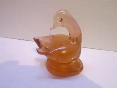 This bird is in good used condition with no damage. It measures 4&1/2 inches tall, 3&3/4 inches long...