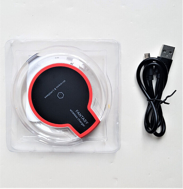 Brand new wireless phone charger with USB in its original box in Cell Phone Accessories in Mississauga / Peel Region