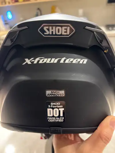I am selling a Shoei X-Fourteen motorcycle helmet in black. 2019 model size L. This helmet is in gre...