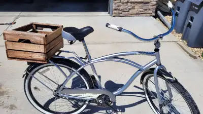 MINT CONDITION - MEN AND WOMEN BIKE. Metallic grey (men's) and beach blue and white (women's). Used...