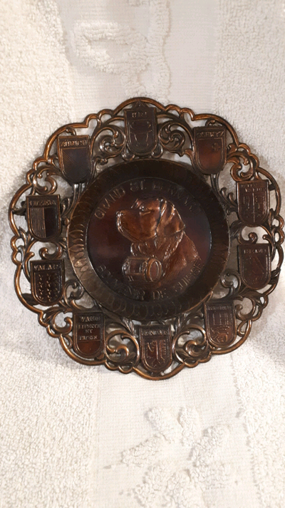 Small metal wall plate from Switzerland 6 inches or 15 centimeters in diameter
