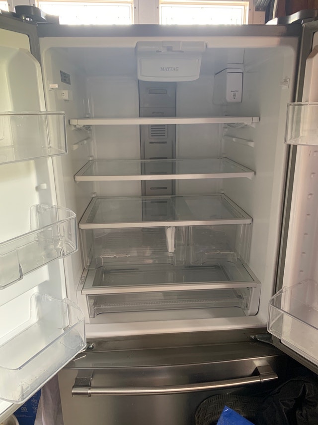 Maytag Stainless Steel Refrigerator w/ ice maker and water dispe