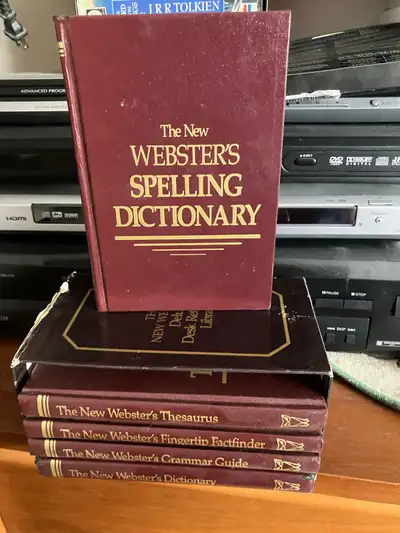 treasure trove of linguistic knowledge with The New Webster's Deluxe Desk Reference Library! collect...