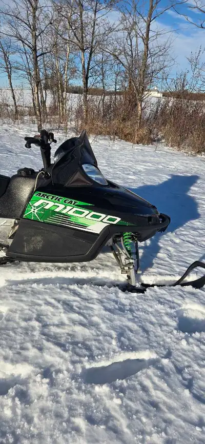 I have a 2009 Arctic m1000 for sale. It has about 3600 kms on it. The track is in decent shape, the...